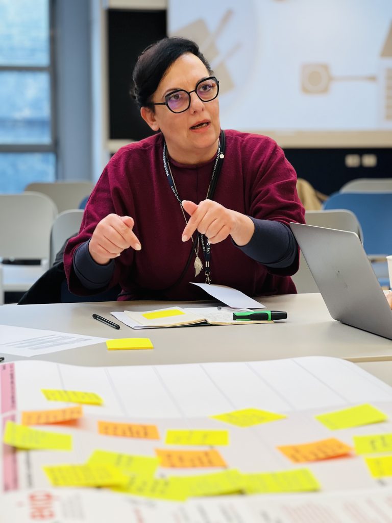 Mariagrazia Berardi participating in the ekip Policy Lab in Milan, discussing the Digital Product Passport and sustainability in the fashion and textile sector.